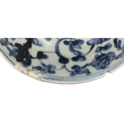 3024 - A Ming Dynasty glazed shallow bowl, with a painted circular panel depicting a dragon amongst clouds,... 