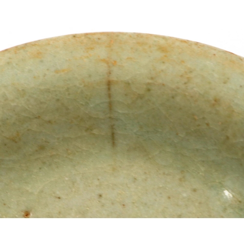 3029 - A Ming Dynasty celadon glazed shallow dish or stand, D: 12 cm, H: 3 cm. P&P Group 2 (£18+VAT for the... 