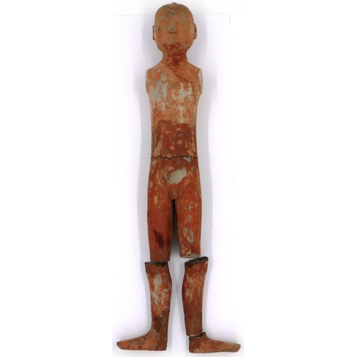 3031 - A Western Han Dynasty Stick Man terracotta figure, the male undressed, lacking its wooden arms and r... 