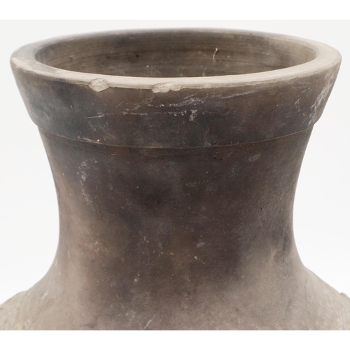 3032 - An early Qing Dynasty grey clay jar, baluster form with integral faux ring handles, footed base and ... 