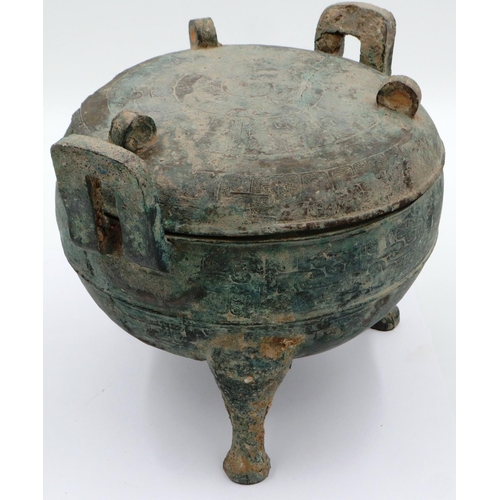 3034 - An archaic Shang Dynasty ritual bronze food vessel and cover, finely decorated by engraving througho... 