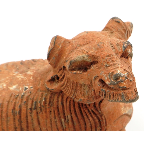 3037 - A Ming Dynasty zoomorphic terracotta ram ornament, hollow formed with incised detail, L: 12 cm, H: 1... 