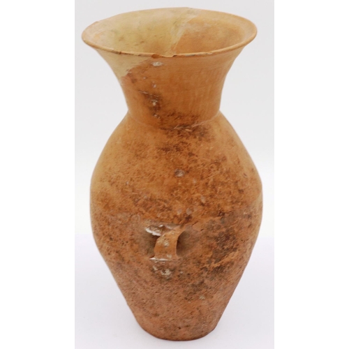 3043 - A Neolithic period terracotta vessel, having two ring handles and flared neck, the body tapering in ... 