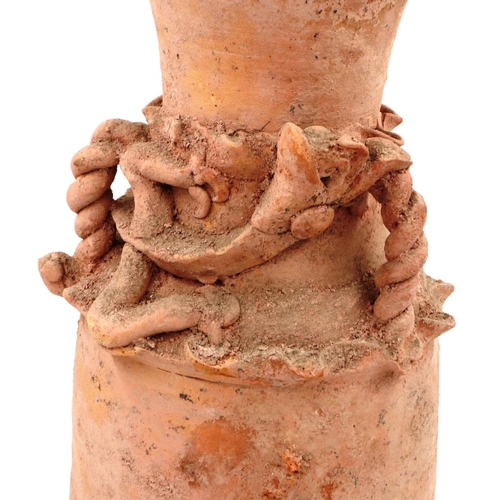 3044 - Han Dynasty terracotta funerary urn, having applied dragon details to the neck, H: 47 cm. 

Not avai... 