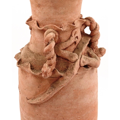 3044 - Han Dynasty terracotta funerary urn, having applied dragon details to the neck, H: 47 cm. 

Not avai... 