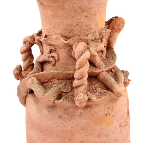 3044 - Han Dynasty terracotta funerary urn, having applied dragon details to the neck, H: 47 cm. 

Not avai... 