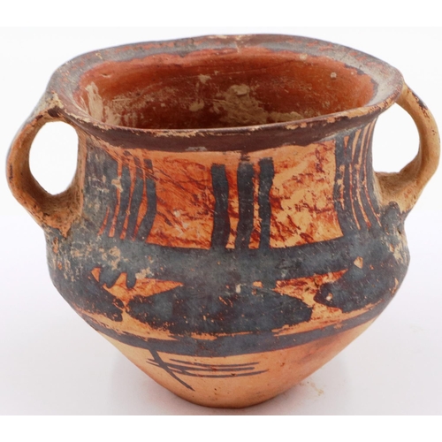 3047 - A Neolithic period painted terracotta twin handled pot, decorated with geometric designs, H: 8 cm, D... 