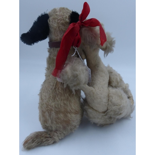 2141 - Two vintage stuffed dogs, Poodle with red bow and another with leather collar, both have glass eyes,... 