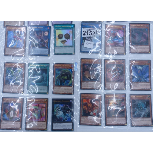 2152 - Large collection of Yu-Gi-Oh! items to include nine boxes and folders of sort after cards. P&P Group... 