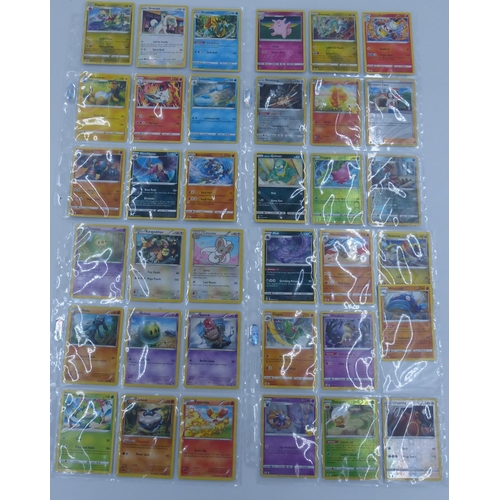 2157 - Very large collection of Pokémon items to include Pokeball tins, tins with cards, boxes, loose cards... 