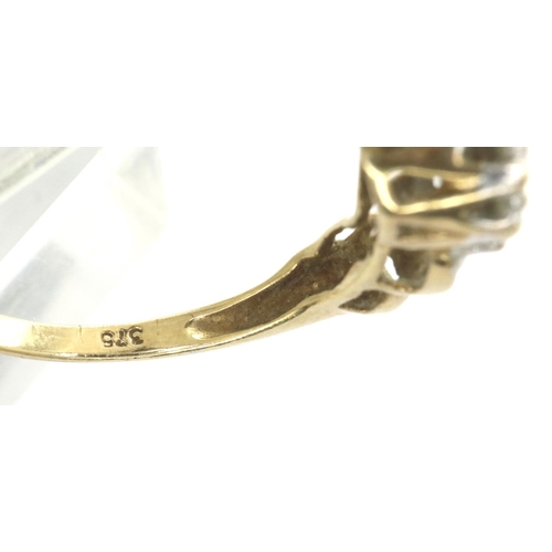 28 - 9ct gold diamond set cocktail ring, size P, 1.8g. P&P Group 1 (£14+VAT for the first lot and £1+VAT ... 