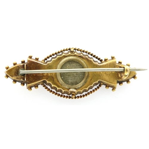 3 - A Victorian 15ct gold diamond set mourning brooch, having a small glazed panel verso, 3.5g. P&P Grou... 