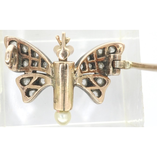 39 - Georgian (presumed, unmarked) 15ct gold butterfly form brooch, with garnet set eyes and diamond set ... 