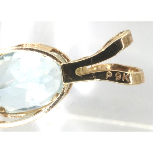 43 - 9ct gold blue topaz set pendant, H: 12 mm, 0.3g. P&P Group 1 (£14+VAT for the first lot and £1+VAT f... 