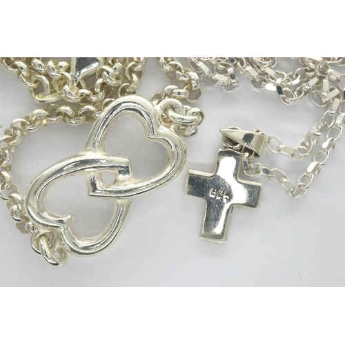 44 - Two 925 silver pendant necklaces to include a cross example, largest chain L: 44 cm, combined 21g. P... 