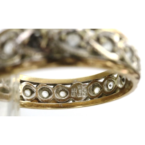 9 - 9ct gold full eternity ring set with white topaz, size N/O, 2.7g. P&P Group 1 (£14+VAT for the first... 