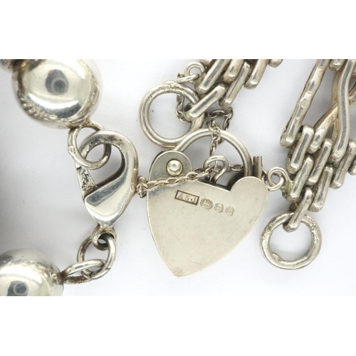 67 - Two 925 silver bracelets to include a heart padlock example, largest L: 16 cm, combined 57g. P&P Gro... 