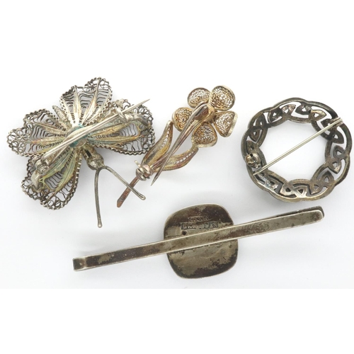 76 - Four 925 silver brooches to include a Butterfly example, largest L: 70 mm, combined 22g. P&P Group 1... 