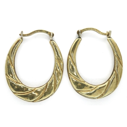 84 - Pair of 9ct gold and silver hoop earrings, L: 25 mm, 1.0g. P&P Group 1 (£14+VAT for the first lot an... 