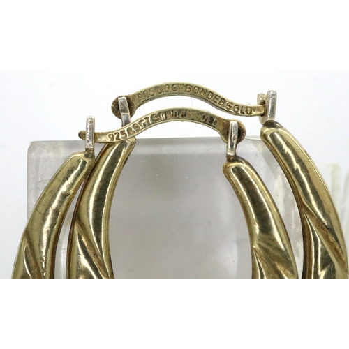 84 - Pair of 9ct gold and silver hoop earrings, L: 25 mm, 1.0g. P&P Group 1 (£14+VAT for the first lot an... 