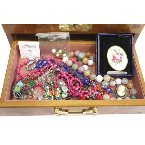 109 - A large quantity of costume jewellery within a modern yew wood fitted jewellery box. P&P Group 1 (£1... 