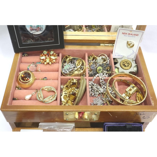 109 - A large quantity of costume jewellery within a modern yew wood fitted jewellery box. P&P Group 1 (£1... 