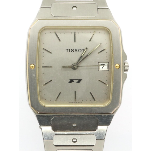 120 - Tissot F1: gents stainless steel wristwatch with white dial and graduated steel bracelet, working at... 