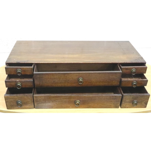 402 - Mahogany ten drawer unusual chest, 62 x 26 x 17 cm H. Not available for in-house P&P