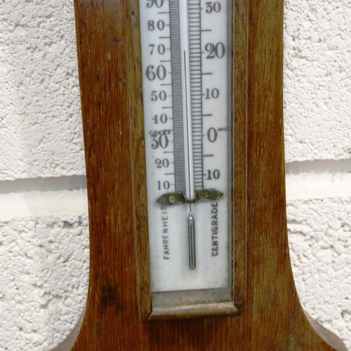 413 - Oak framed Aneroid barometer/thermometer, H: 71 cm. Not available for in-house P&P