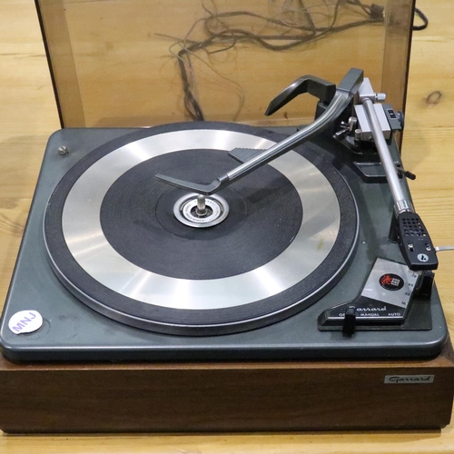 446 - Garrard 60 Mk2 automatic turntable with Audio Technica magnetic cartridge and original cover. Not av... 