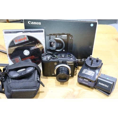 466 - Canon Powershot G7 camera with charger, spare batteries etc, in working order. P&P Group 2 (£18+VAT ... 