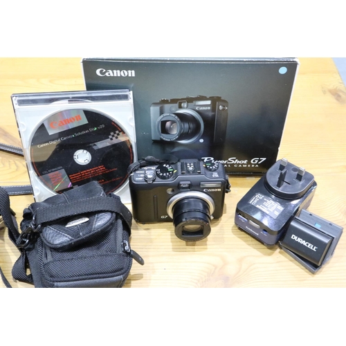 466 - Canon Powershot G7 camera with charger, spare batteries etc, in working order. P&P Group 2 (£18+VAT ... 