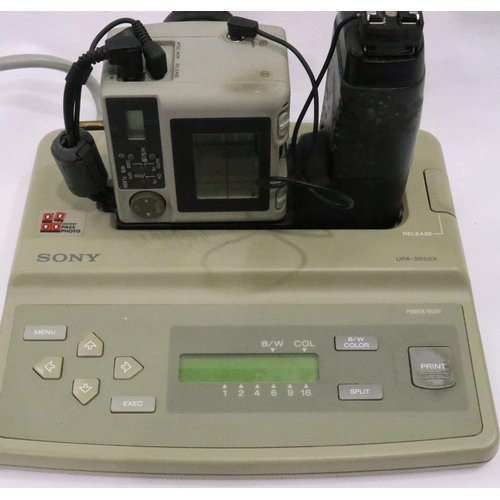 473 - Sony UPA-2050X passport camera with dock. P&P Group 2 (£18+VAT for the first lot and £3+VAT for subs... 