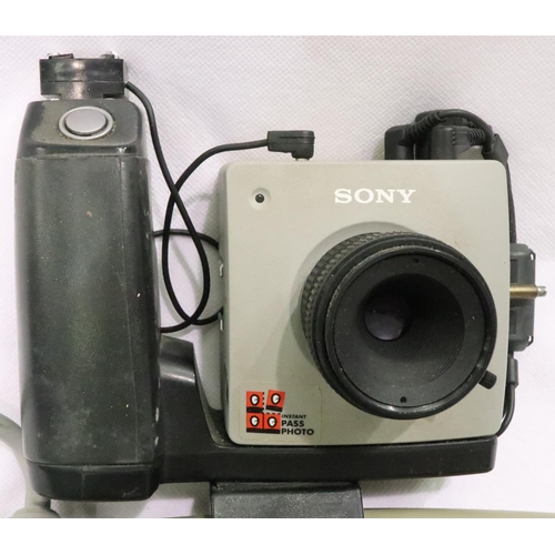 473 - Sony UPA-2050X passport camera with dock. P&P Group 2 (£18+VAT for the first lot and £3+VAT for subs... 