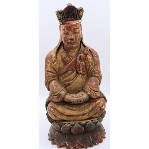 3049 - A large and rare Ming Dynasty gilt wood seated figure of a court official, raised on a lotus-leaf ba... 