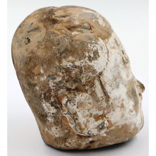 3050 - A Han Dynasty terracotta head of a lady, H: 10 cm. P&P Group 2 (£18+VAT for the first lot and £3+VAT... 