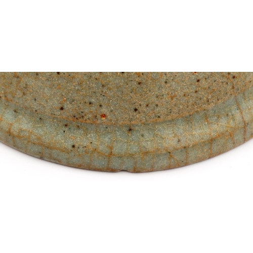 3056 - A Song Dynasty glazed bowl, near celadon in colour, D: 16 cm, H: 6 cm. Some chips to the rim and min... 