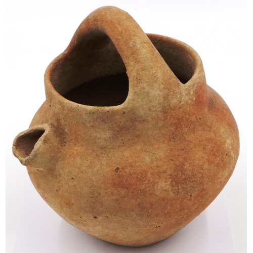 3062 - A Han Dynasty terracotta vessel, with short spout having straining holes and integral handle, D: 19 ... 