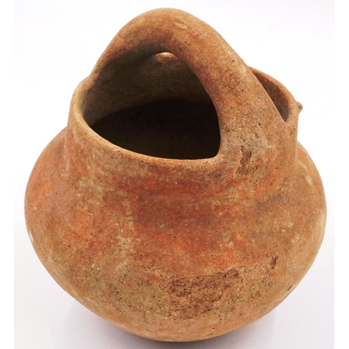 3062 - A Han Dynasty terracotta vessel, with short spout having straining holes and integral handle, D: 19 ... 