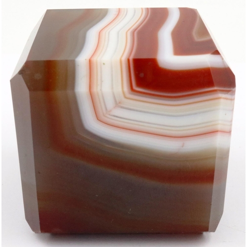 3071 - A heavily banded polished chuyu red agate cube, having chamfered edges, 5 x 5 x 5 cm. P&P Group 2 (£... 