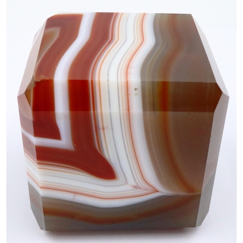 3071 - A heavily banded polished chuyu red agate cube, having chamfered edges, 5 x 5 x 5 cm. P&P Group 2 (£... 