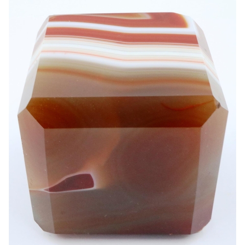 3071 - A heavily banded polished chuyu red agate cube, having chamfered edges, 5 x 5 x 5 cm. P&P Group 2 (£... 