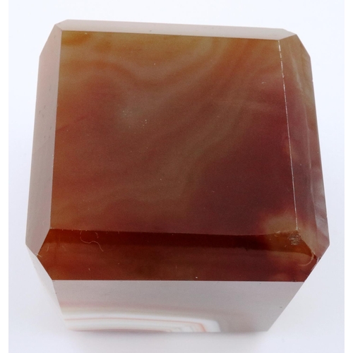 3071 - A heavily banded polished chuyu red agate cube, having chamfered edges, 5 x 5 x 5 cm. P&P Group 2 (£... 