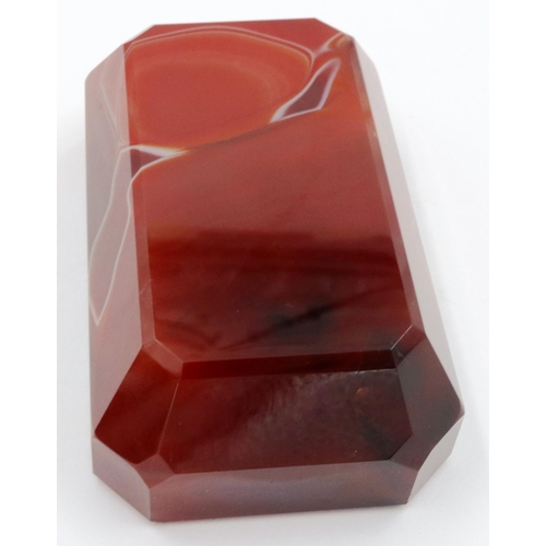 3074 - A banded and polished chuyu red agate block, with bevelled edges and of tapering form, 9 x 5.5 x 3 c... 