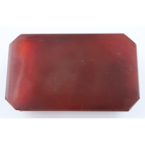 3074 - A banded and polished chuyu red agate block, with bevelled edges and of tapering form, 9 x 5.5 x 3 c... 