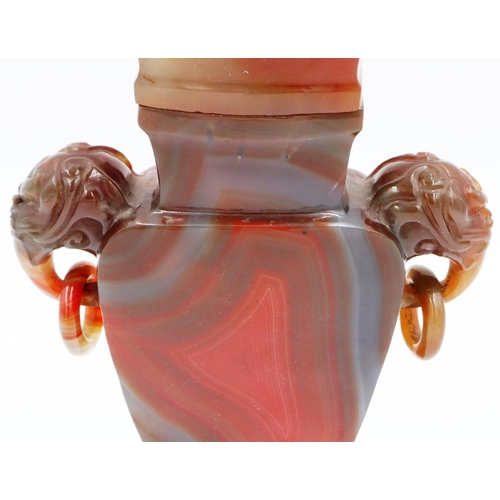 3077 - A large and important carved agate flask, covered, having Fo-dog and ring handles and a carved templ... 