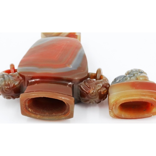 3077 - A large and important carved agate flask, covered, having Fo-dog and ring handles and a carved templ... 