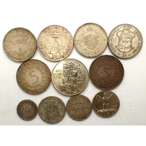 3092 - Eleven world silver coins, combined 98g. P&P Group 0 (£5+VAT for the first lot and £1+VAT for subseq... 