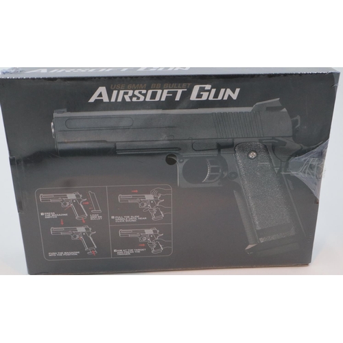 2003 - New boxed 6mm BB airsoft pistol, model V19, in tan. P&P Group 2 (£18+VAT for the first lot and £3+VA... 