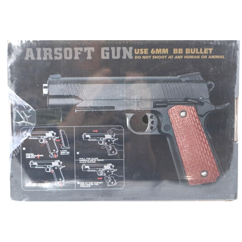 2006 - New boxed 6mm airsoft BB pistol, model V13, in tan. P&P Group 2 (£18+VAT for the first lot and £3+VA... 